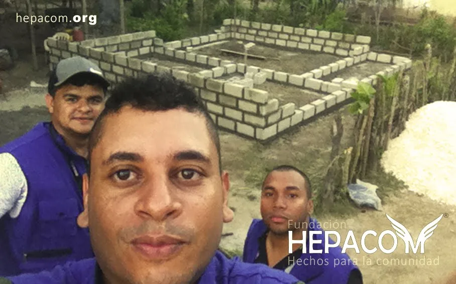 The Hepacom volunteer team in the middle of construction