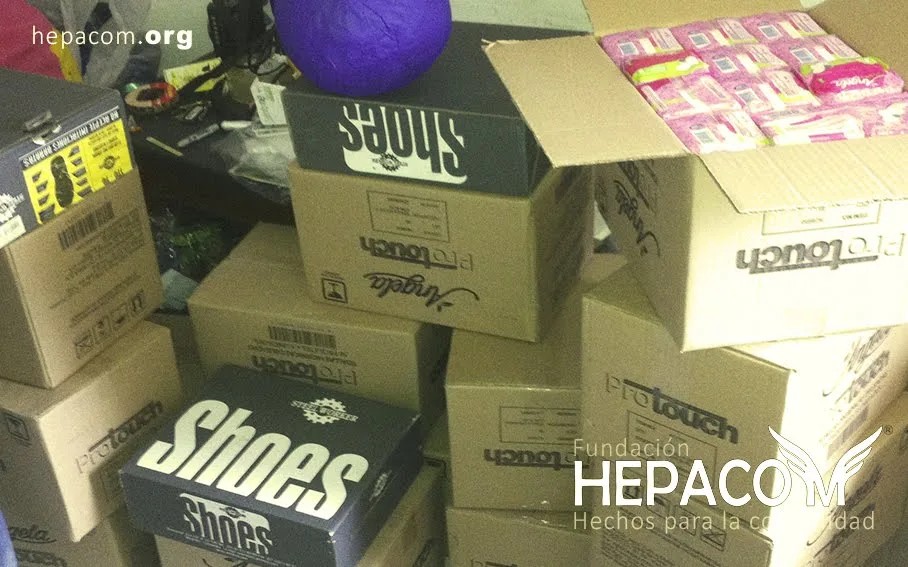 Delivery of donations and food baskets to families by Hepacom